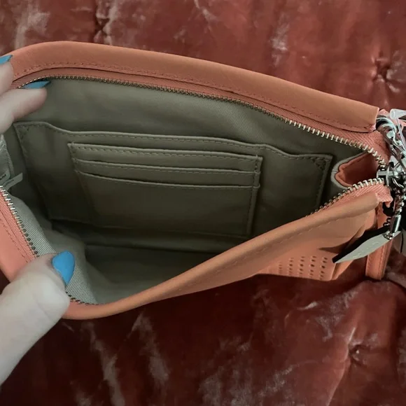 Coach Perforated Coral Wristlet - Picture 2 of 2